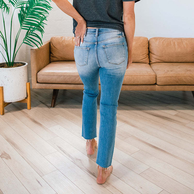 Women's High-Waist Jeans with Button Detail and Frayed Hem