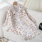Women's Elegant Poncho with Fringe Details and Modern Plaid Pattern