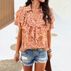 Women's Blouse with Voluminous Ruffles and Floral Patterns