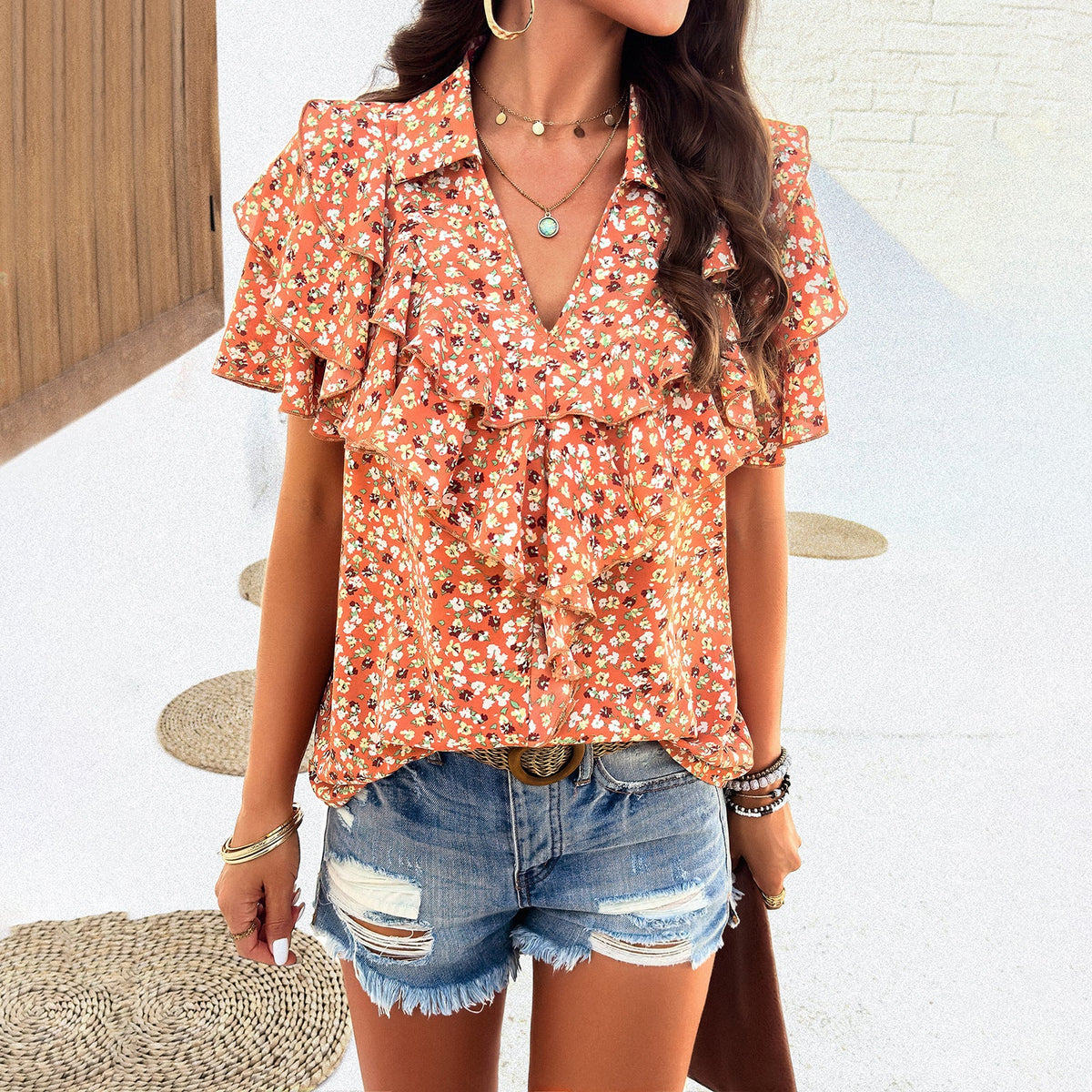 Women's Blouse with Voluminous Ruffles and Floral Patterns
