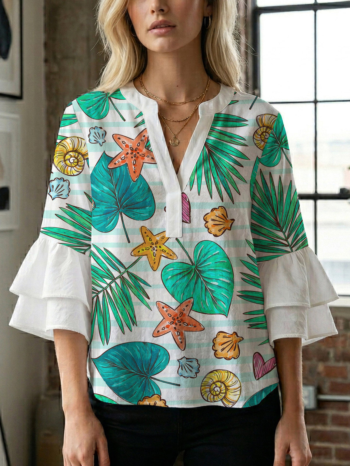 Women's Blouse with Voluminous Ruffle Sleeves and Modern Print