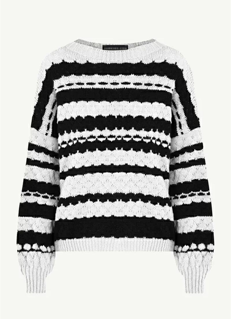 Women's Cozy Knit Sweater with Cable Knit Pattern and Graphic Accents