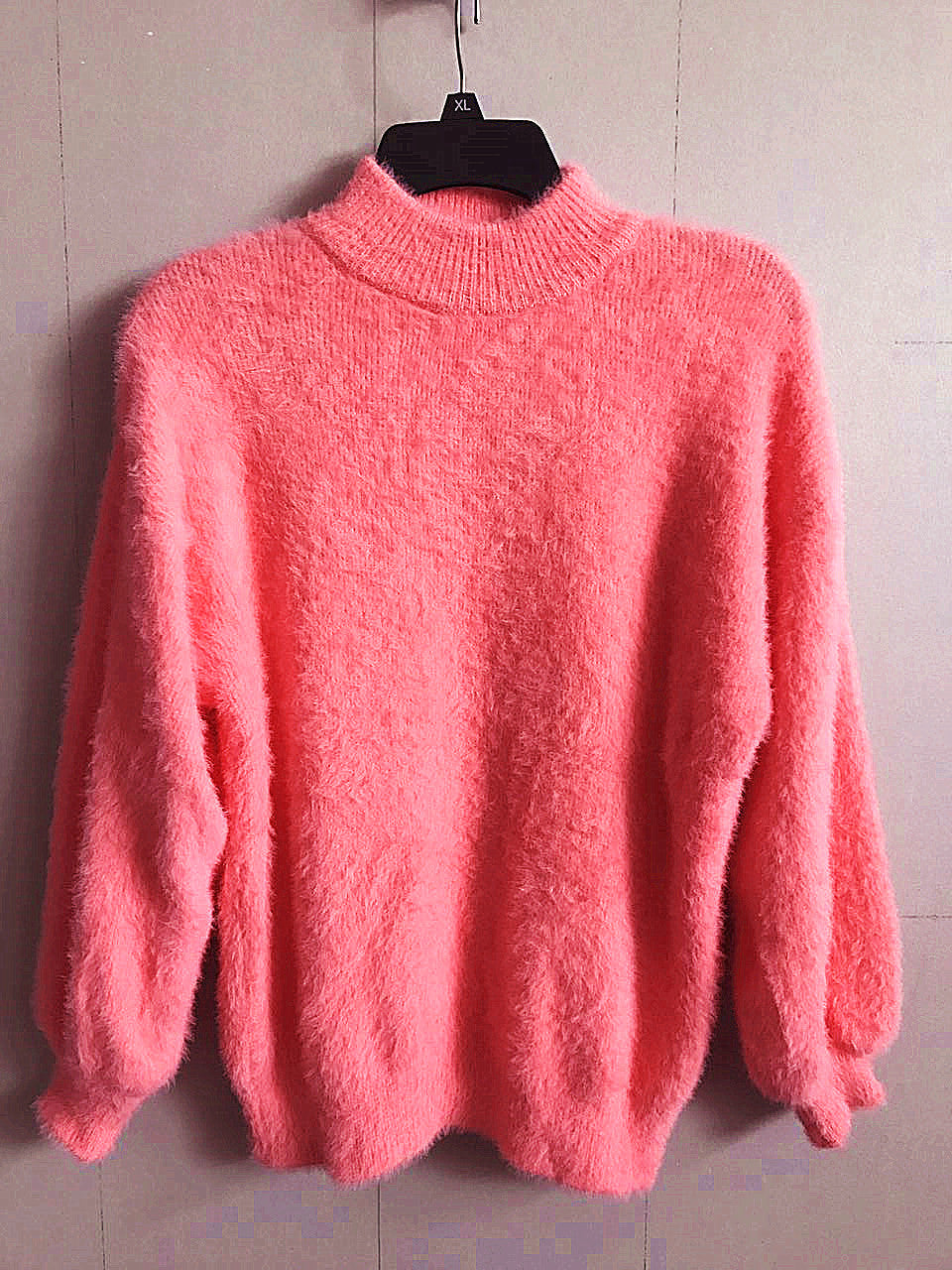 Women's fluffy turtleneck pullover with puff sleeves and textured design