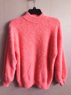 Women's fluffy turtleneck pullover with puff sleeves and textured design