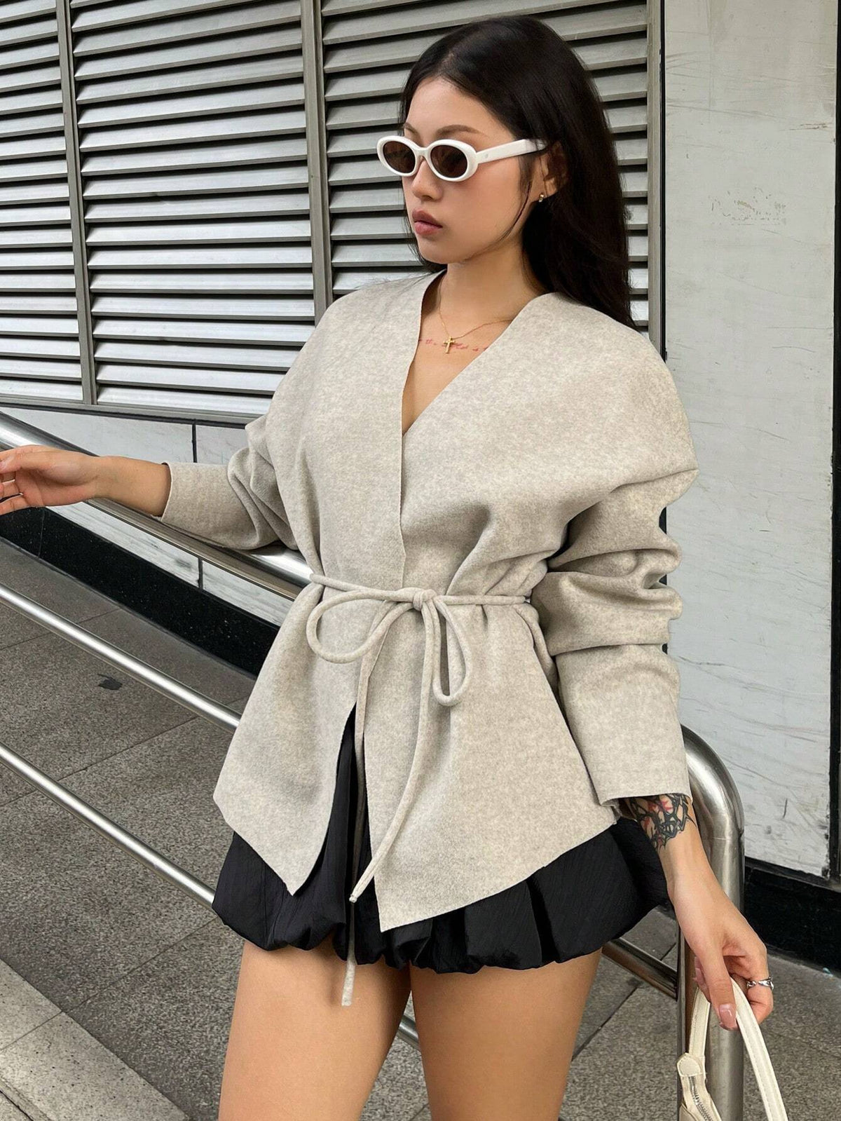 Elegant Wrap Coat with Tailored Fit and Fashionable Details