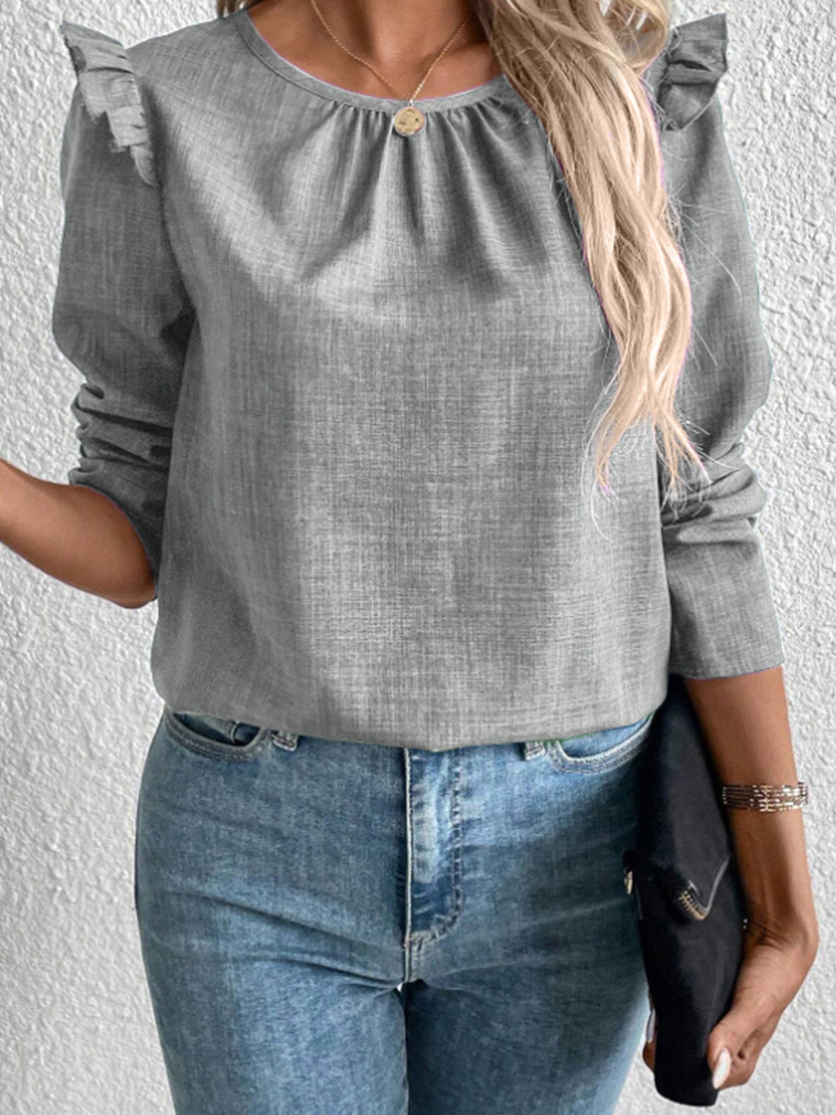 Elegant Blouse with Ruffle Details and Round Neckline