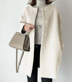 Elegant Oversized Wool Coat with Double-Button Closure and Side Pockets