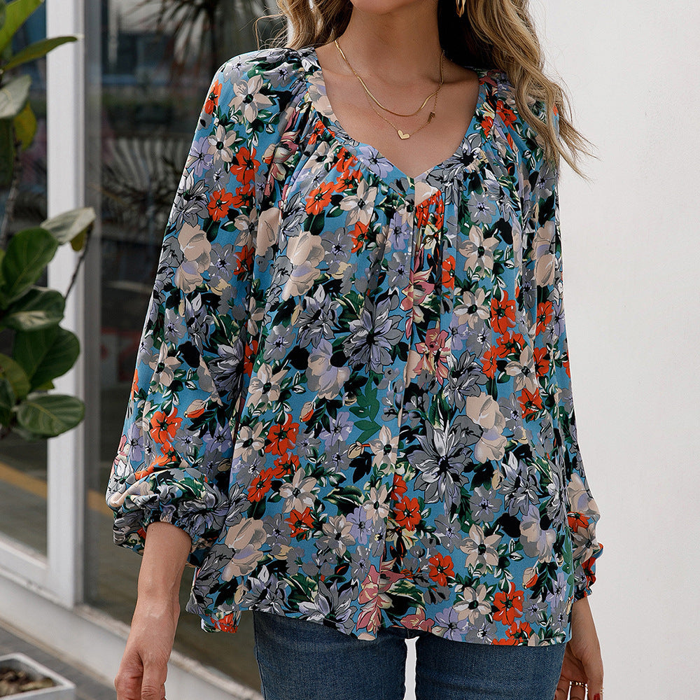 Women's Blouse with Floral Patterns and Airy Sleeves