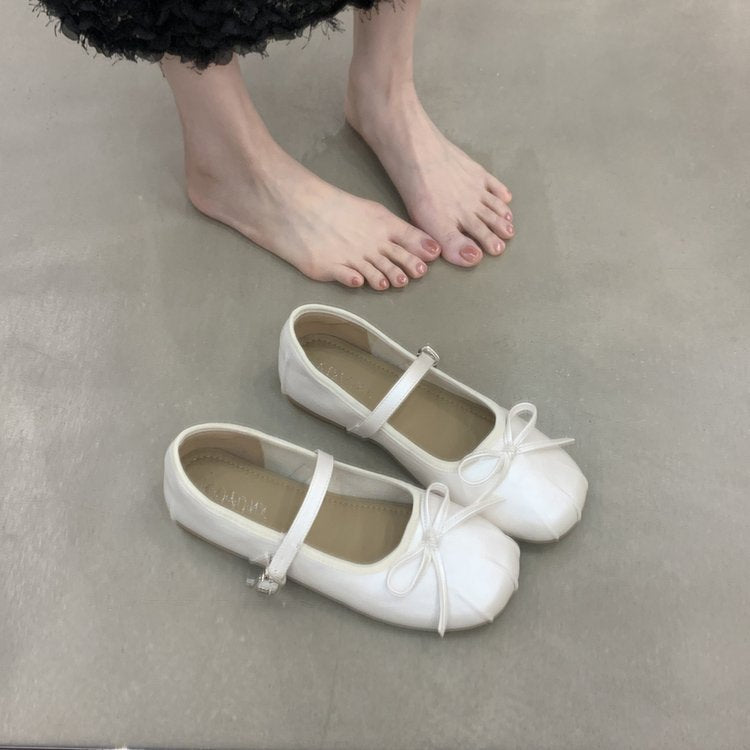 Women's ballet flats with decorative strap and comfortable footbed