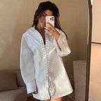 Blouse with Ruffle Design and Elegant Lacing