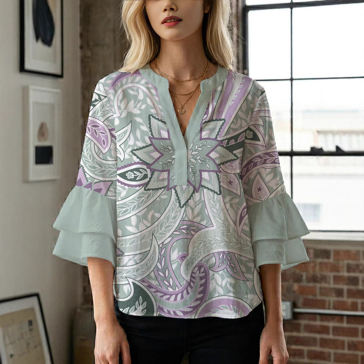 Women's Blouse with Voluminous Ruffle Sleeves and Floral Design