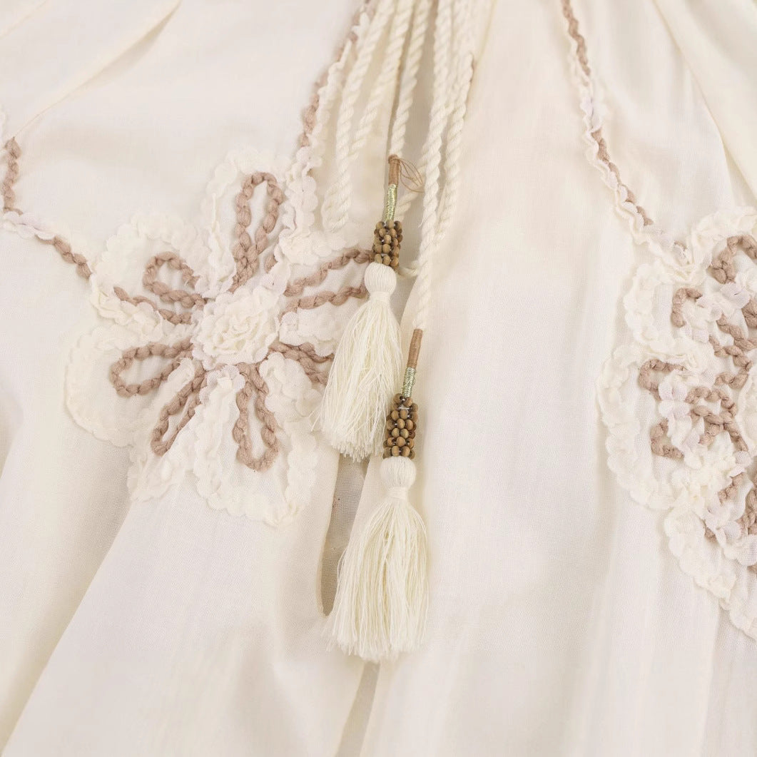 Women's Blouse with Floral Embroidery and Elegant Tassels