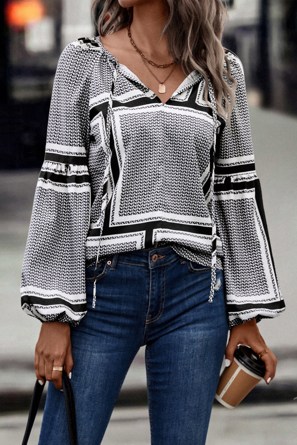 Women's Blouse with Elegant Ruffle Details and Modern Pattern