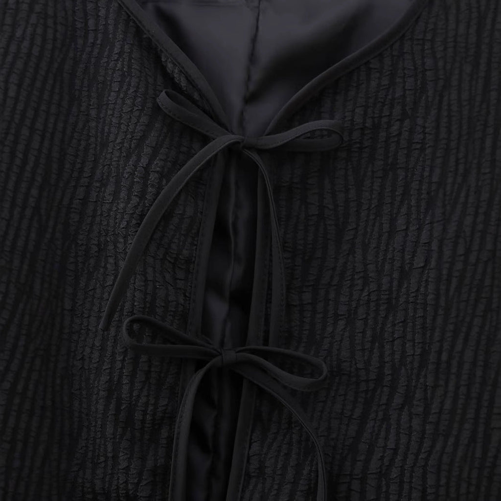 Elegant Quilted Jacket with Ruffle Details and High Collar