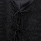 Elegant Quilted Jacket with Ruffle Details and High Collar