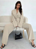 Elegant Women's Oversized Jumpsuit with Waist Belt and Wide Leg