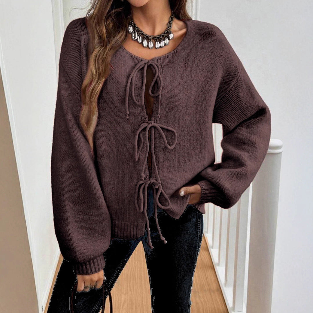 Women's Cozy Knit Sweater with Decorative Lace-Up Detail and Wide Sleeves