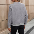 Women's Elegant Sweater with Asymmetrical Neckline and Button Details