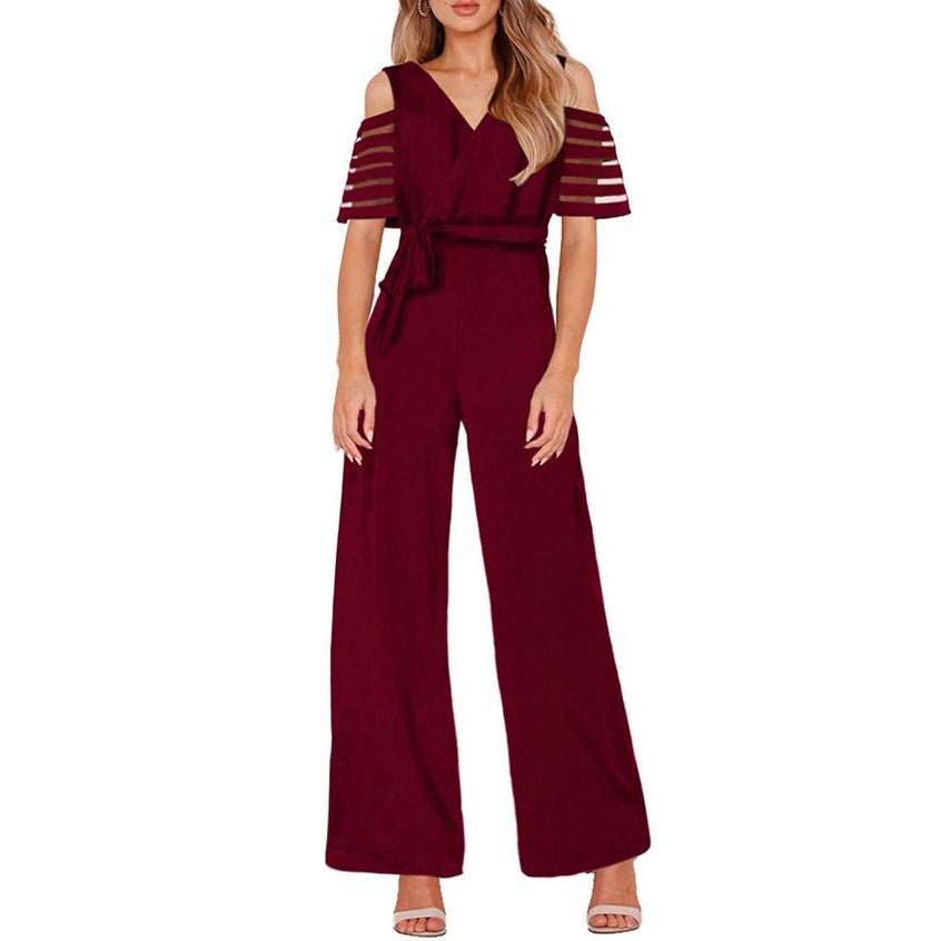 Elegant Jumpsuit with Sheer Sleeve Details and Waist Belt