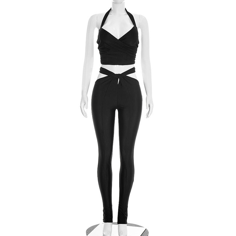 Elegant Outfit with Form-Fitting Pants and Seductive Top