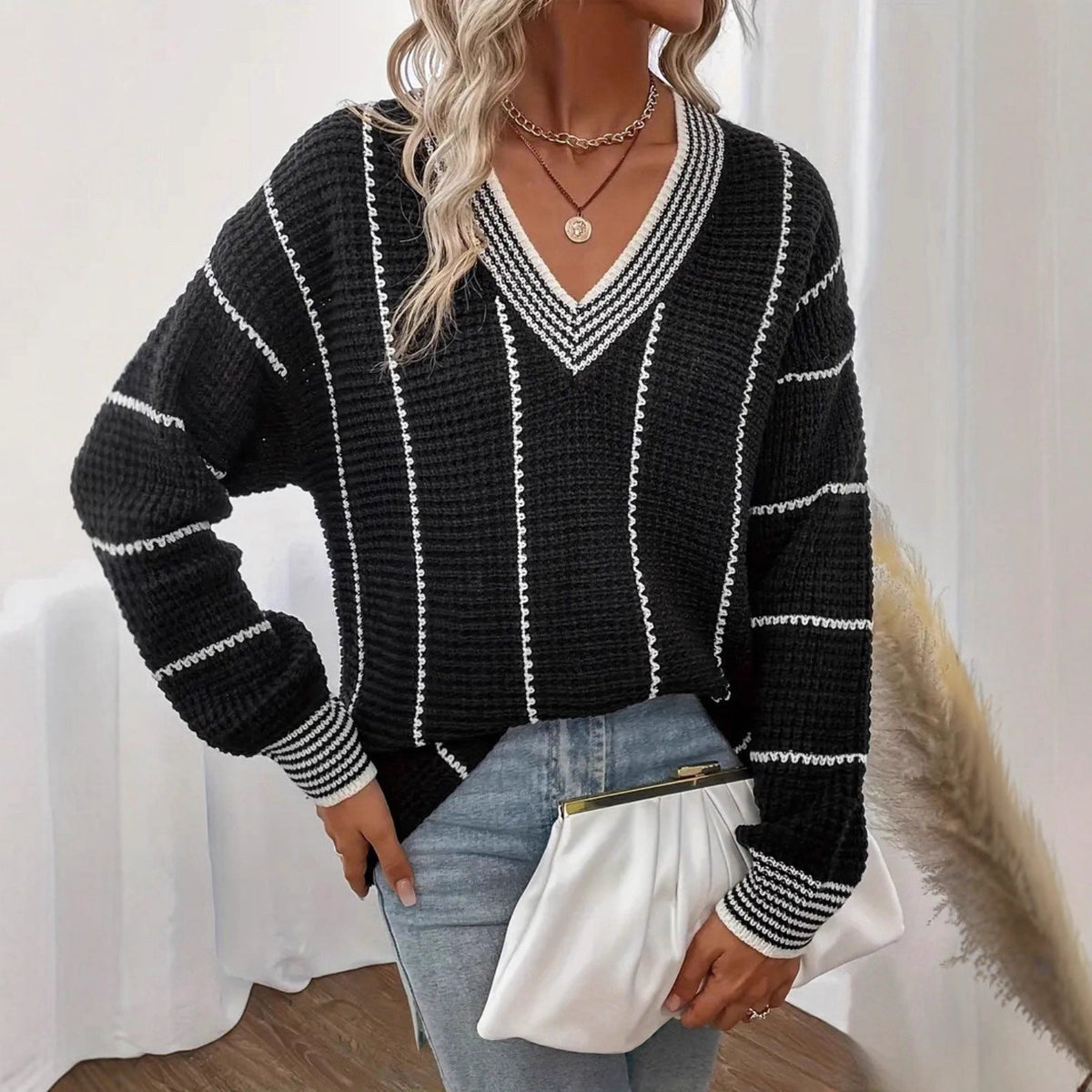 Women's Chunky Knit Sweater with V-Neck and Striped Pattern