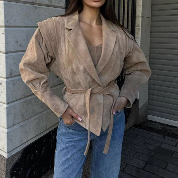Elegant Blazer with Structured Details and Waist Belt