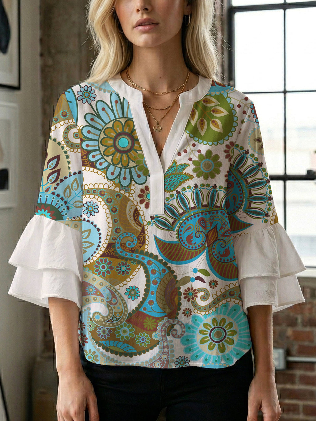 Women's Blouse with Voluminous Ruffle Sleeves and Floral Design