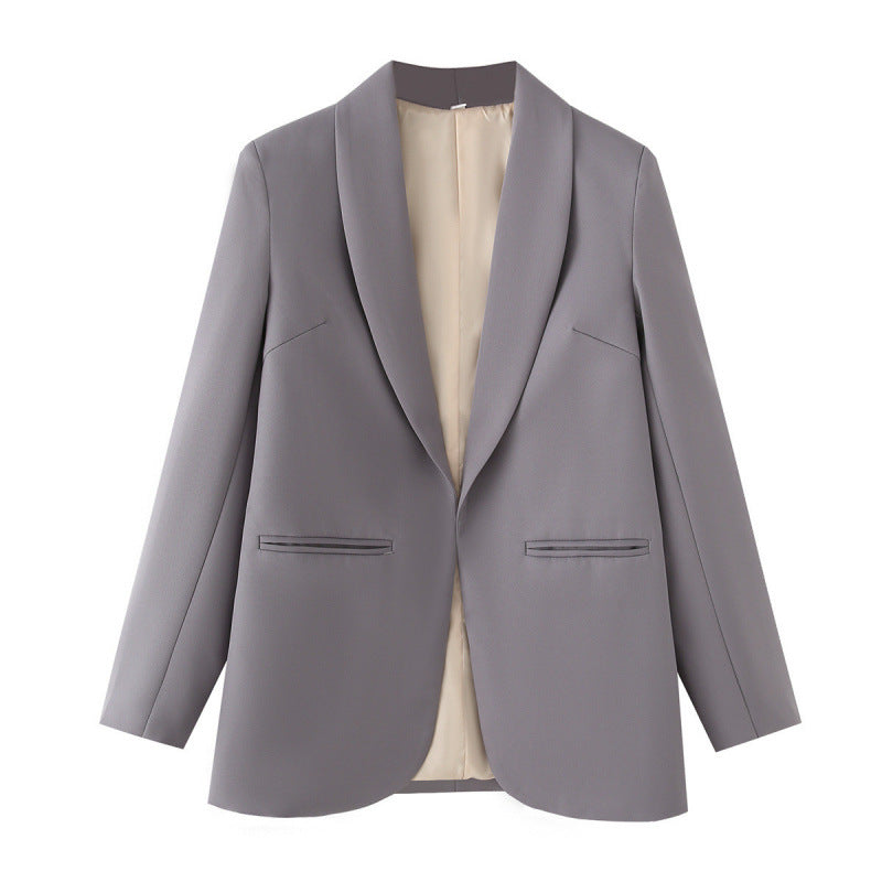Elegant Women's Blazer with Unique Cut and Pockets