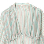 Women's Blouse with Deep V-Neck and Ruffle Details