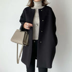 Elegant Oversized Wool Coat with Double-Button Closure and Side Pockets