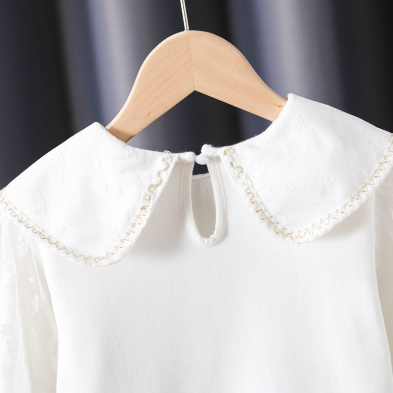 Women's Blouse with Decorative Floral Appliqués and Sheer Puff Sleeves
