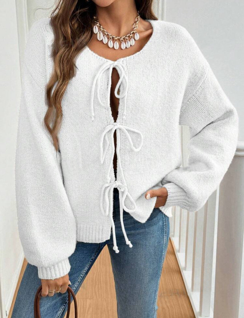 Women's Cozy Knit Sweater with Decorative Lace-Up Detail and Wide Sleeves