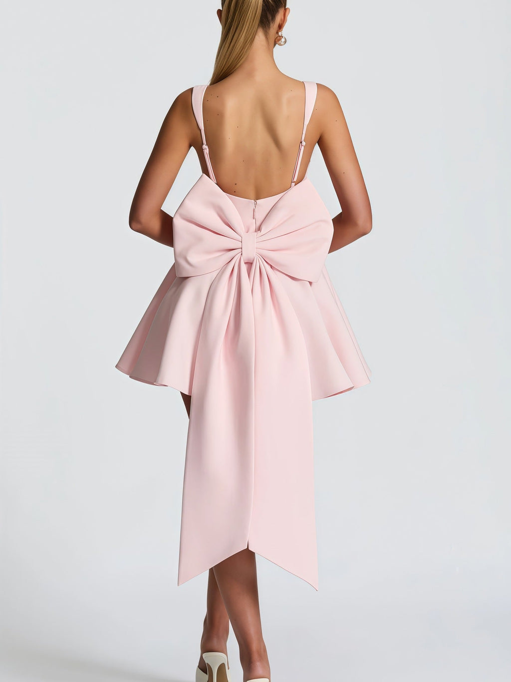 Women's Cocktail Dress with Oversized Bow Design and Flowing Skirt
