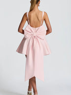Women's Cocktail Dress with Oversized Bow Design and Flowing Skirt