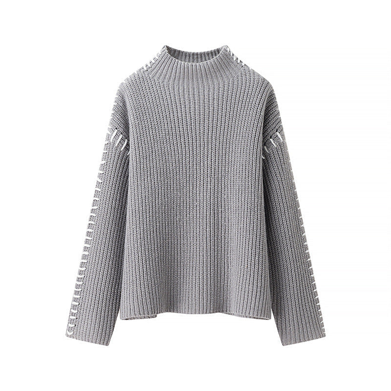 Women's Chunky Knit Sweater with High Collar and Decorative Details