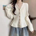 Elegant Knit Cardigan with Textured Design and Puff Sleeves