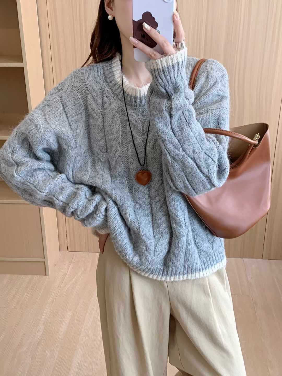 Women's Chunky Knit Sweater with Cable Pattern and Round Neckline