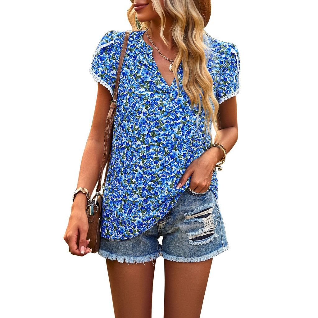 Airy Blouse Shirt with Elegant Floral Design and Playful Sleeves