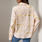 Elegant Long-Sleeve Blouse with Gold Foil Print