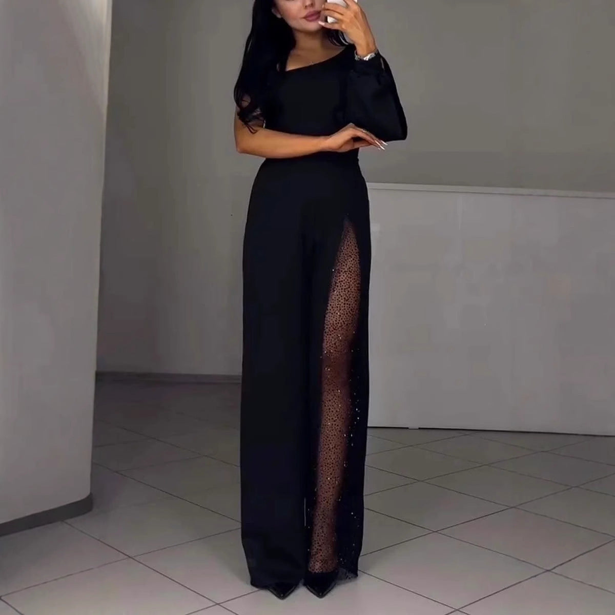 Elegant Jumpsuit with Sheer Inserts and Sequins