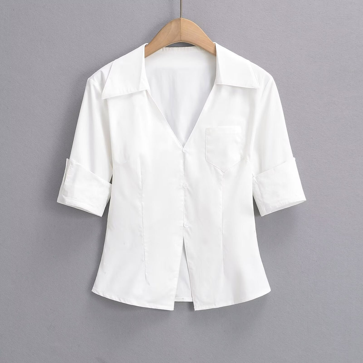 Women's Blouse with Elegant Cut and Pocket Detail