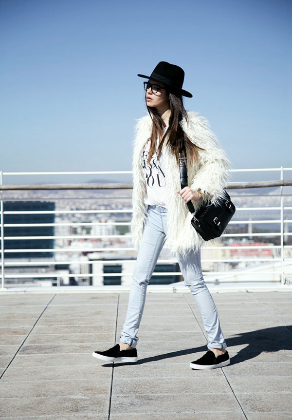 Women's Fluffy Faux Fur Wrap with Generous Cut and Elegant Sleeves