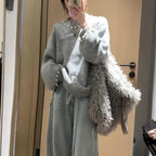 Elegant Sweater with Pearl Design and Relaxed Fit
