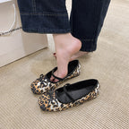 Women's ballet flats with decorative bow accent and comfortable adjustable strap