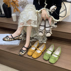 Women's ballet flats with decorative bow accent and comfortable adjustable strap