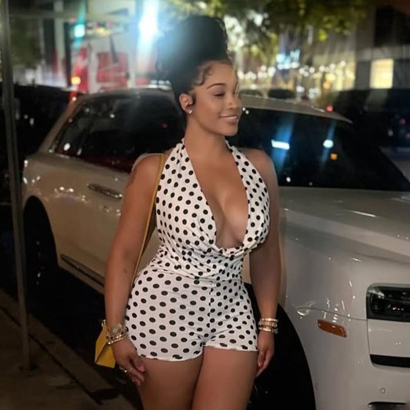 Elegant Playsuit with Deep V-Neck and Modern Polka Dot Pattern