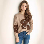 Women's Cozy Pullover with Creative Lettering and Modern Design