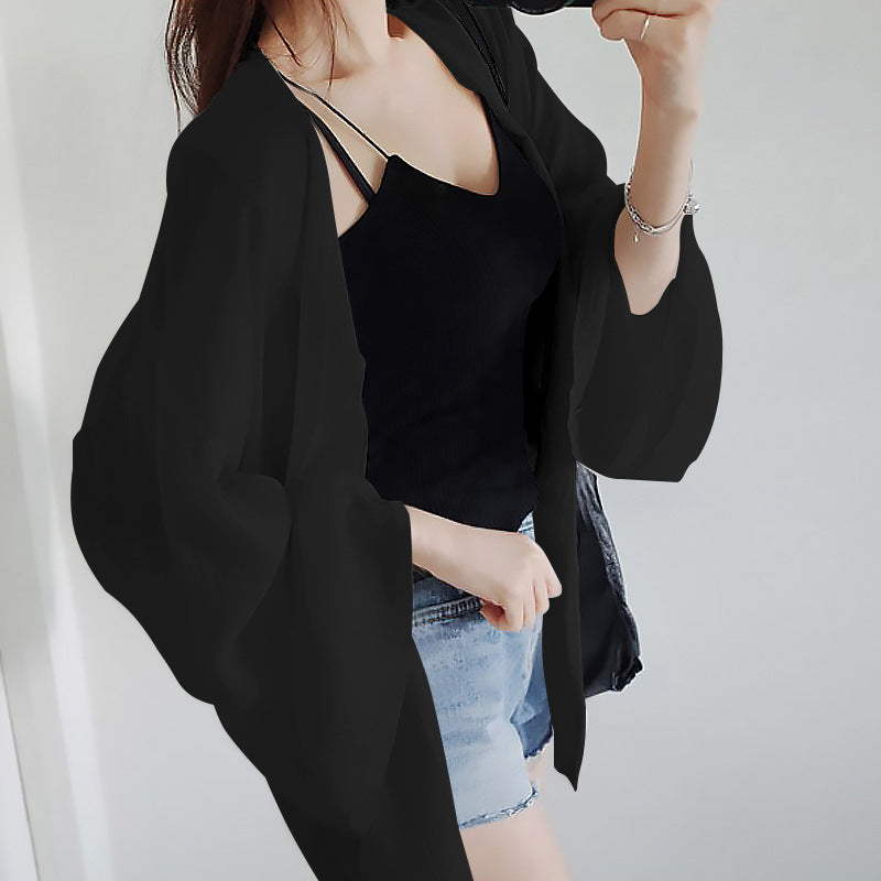 Elegant Kimono Jacket with Loose Fit and Detailed Sleeves