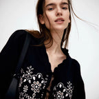 Elegant Blouse with Floral Embroidery and Ruffles