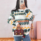 Women's Chunky Knit Sweater with Colorful Zigzag Pattern and Floral Accents